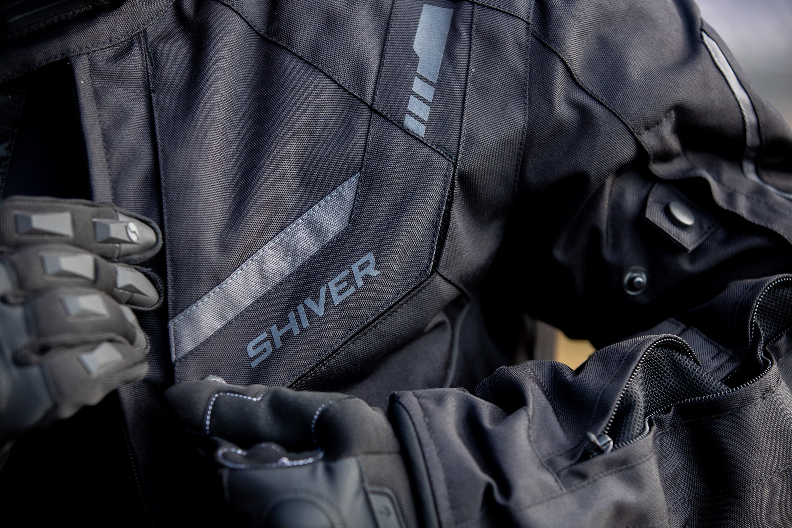 Jaqueta e luva Shiver em detalhe
